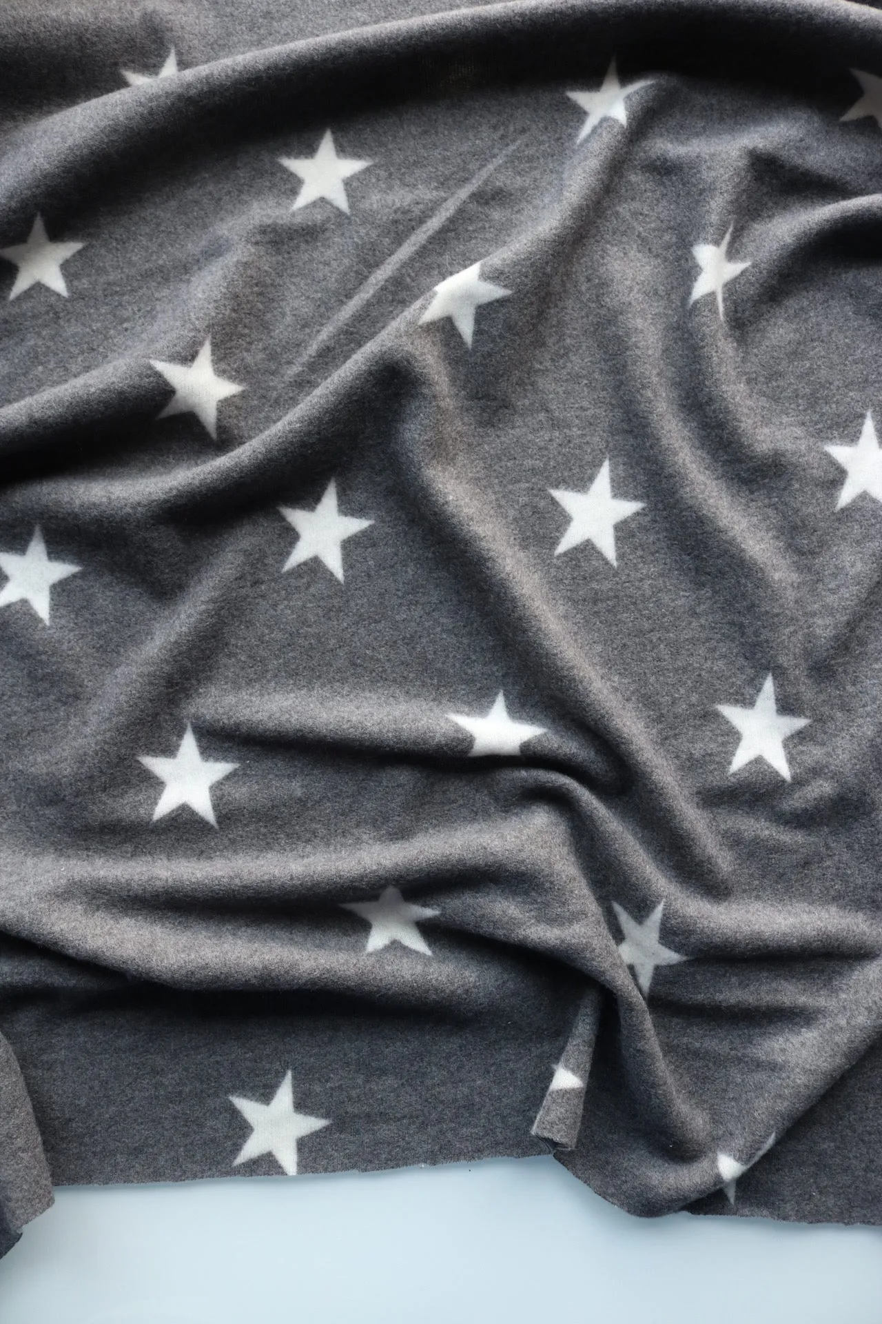 White Stars on Charcoal Alpaca Soft Brushed Sweater Knit